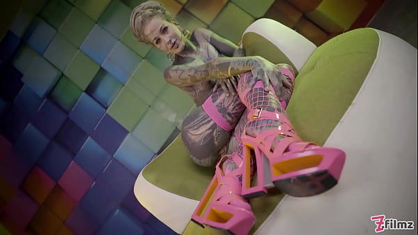 Heavily tattooed TEEN wrecking her hole with an ANAL stretch session